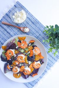 sweet potato beet shrimp salad feta blue napkin spoon