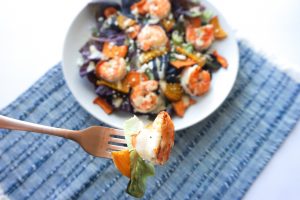 sweet potato beet shrimp salad feta blue napkin fork bite